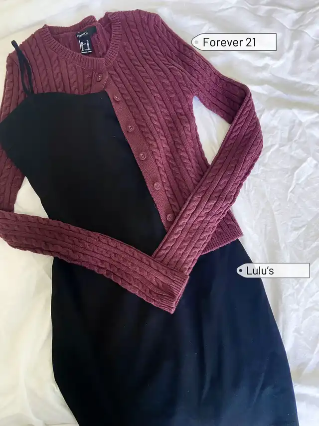 A flat lay of a black mini dress from Lulu's paired with a red cable knit cardigan from Forever21, presenting a fall outfit idea.