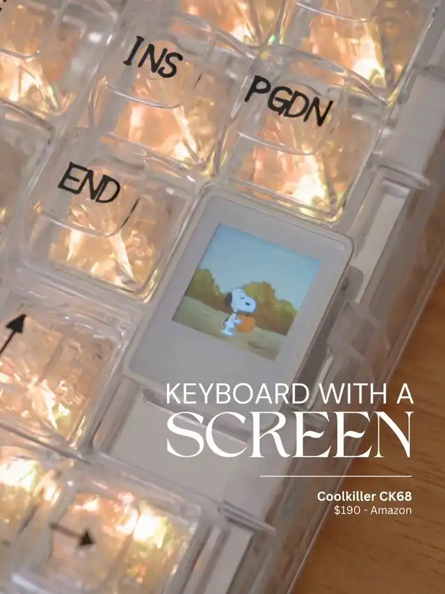 A close-up of a clear mechanical keyboard with illuminated transparent keycaps. An integrated LCD screen displays a cartoon character. Text overlays highlight the keyboard's screen feature.
