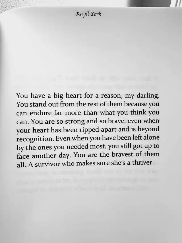 A motivational quote by Kayil York on a light background, stating, 'You have a big heart for a reason, my darling. You are so strong and so brave... A survivor who makes sure she's a thriver.' The image also includes 'lemon8 @goodgirlstore' at the bottom.
